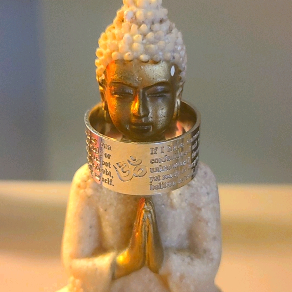 Ohm ring. Nearly a size 7. Never been worn.